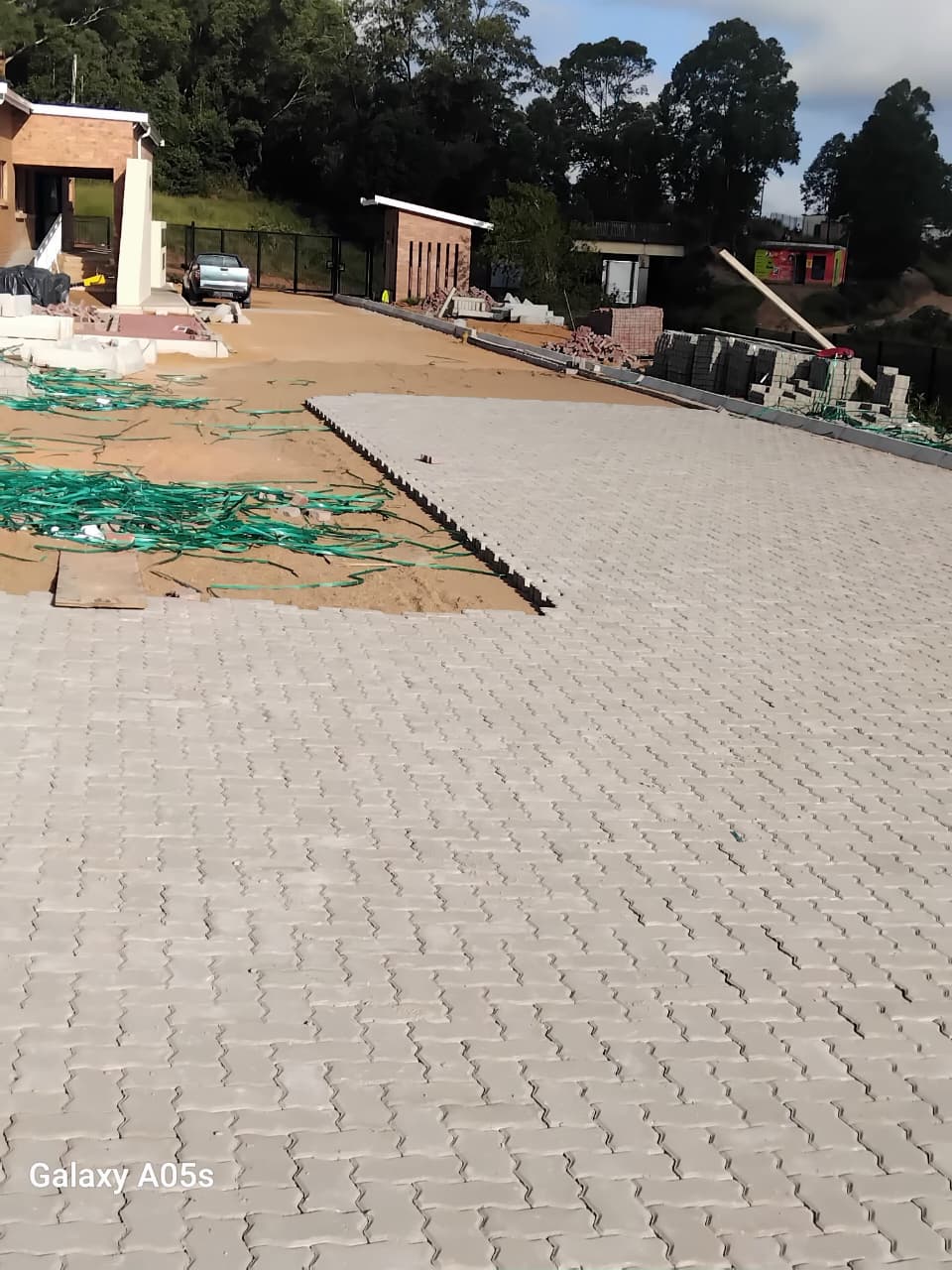 Large grey interlocking paved commercial courtyard